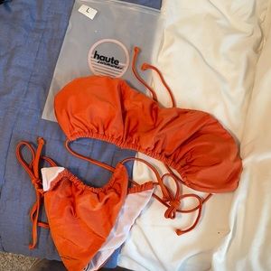 Burnt orange Haute Swimwear Suit.